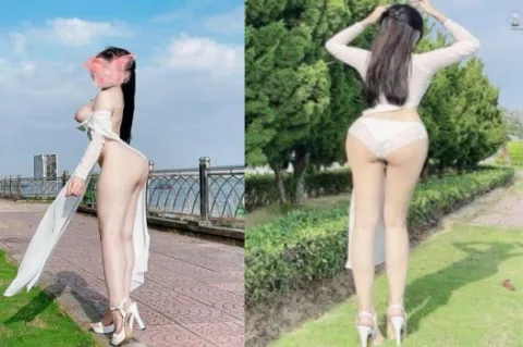 Em áo dài hở hang phô bím gần mé sông